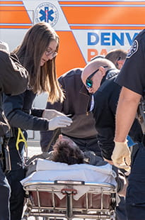 Denver Health Paramedics with patient