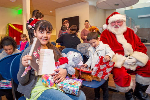 Santa Visiting Children