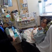 Mother with baby in NICU