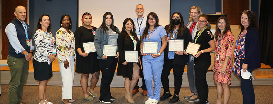 Scholarship Winners with Education Staff