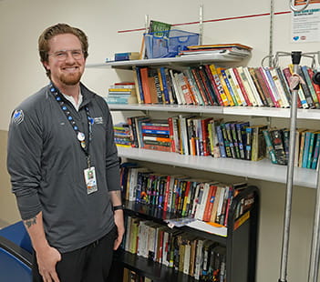 Denver Health chaplain starts library for patients in correctional care