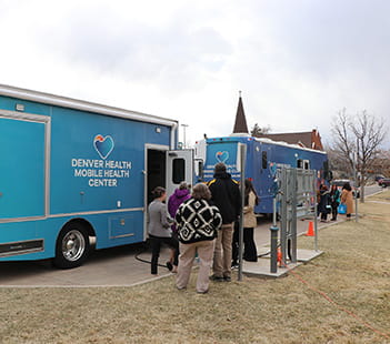 Denver Health staff and community partners tour Mobile Health Centers