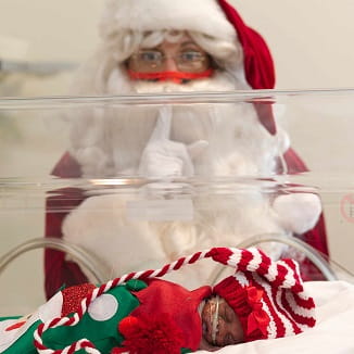 Santa Pays a Visit to Denver Health NICU Babies