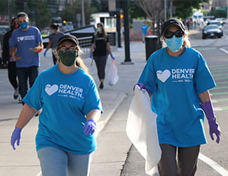 Denver Health Denver Health Foundation pick up trash volunteer on Denver streets