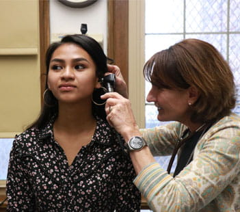 Denver-Health-School-Based-Health-Center-Patient-Doctor