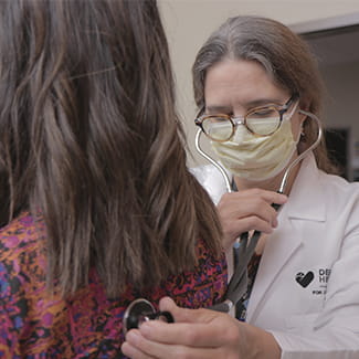 woman at Denver Health clinic All of Us Research