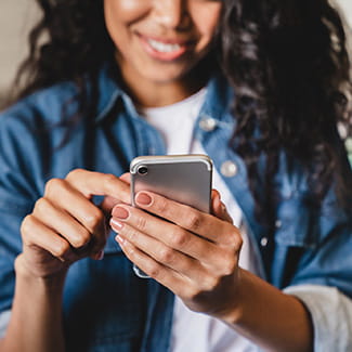 woman texting MyChart