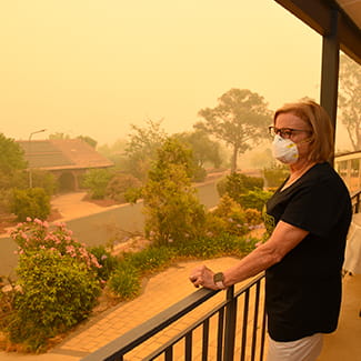 woman in mask during wildfire COVID-19 Denver Health