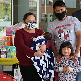 Denver Health COVID-19 patient Ruth Esparza with her family after recovery