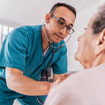 nurse uses a stethoscope