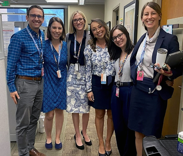 Six faculty members pose for a group photo
