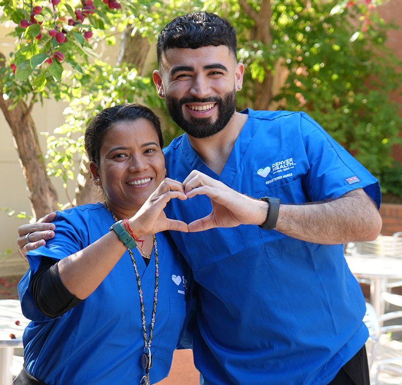 Denver Health nurses forming a heart shape with their hands