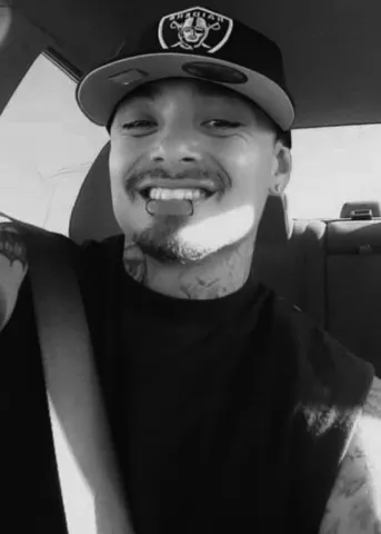 A black and white portrait of Kyle