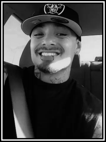 A black and white portrait of Kyle