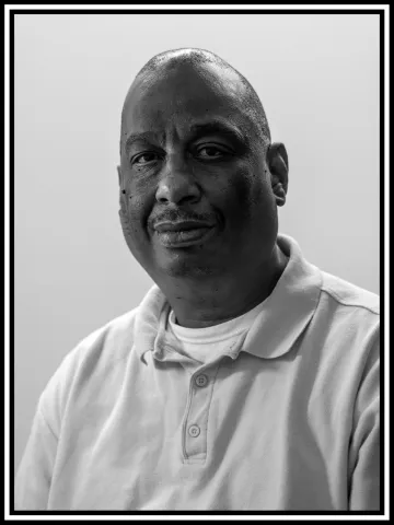 A black and white portrait of Percy
