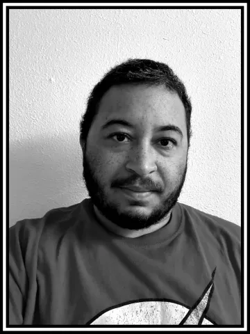 A black and white portrait of Remus