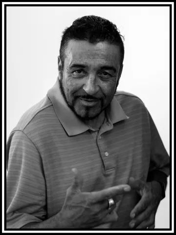 A black and white portrait of Vicente