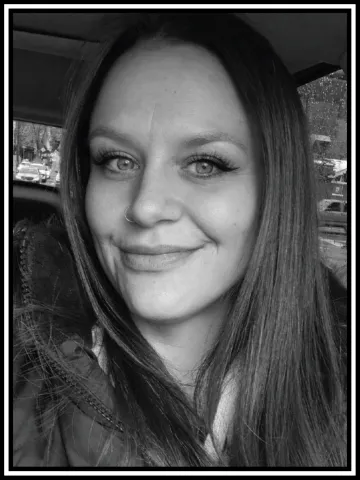 A portrait of Kate in black and white