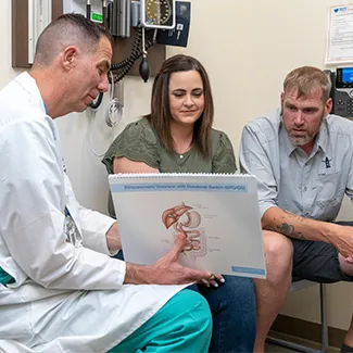 Bariatric surgeon with patients at Denver Health.